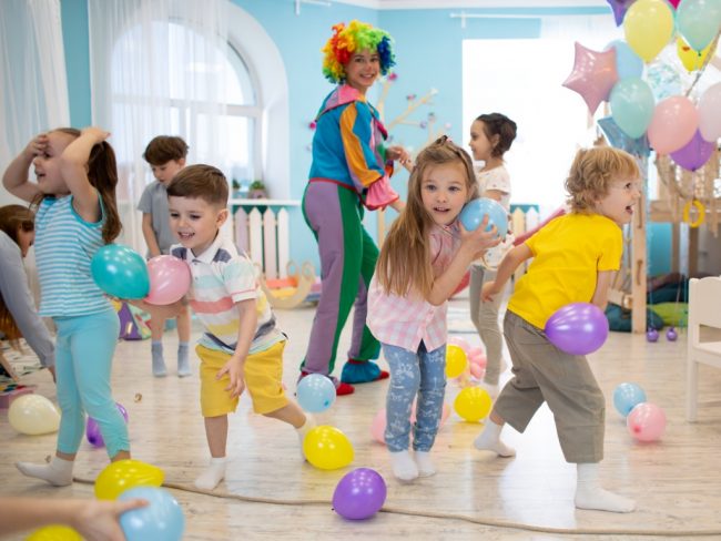 Kids balloon party with clown, happy birthday party with clown and balloons